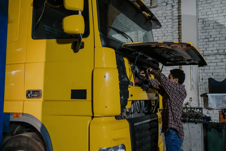 Truck engine being serviced in a workshop